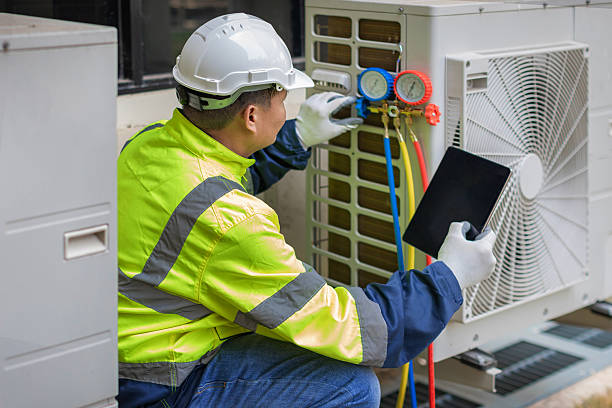 Professional Ac Installation technician working in Angier, NC